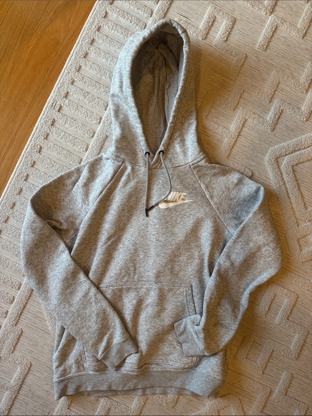 Nike women’s Light Gray Pullover Hoodie with White Swoosh